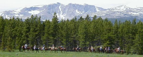 Horseback Riding under the shadows of the Big Horn Mountains in Wyoming